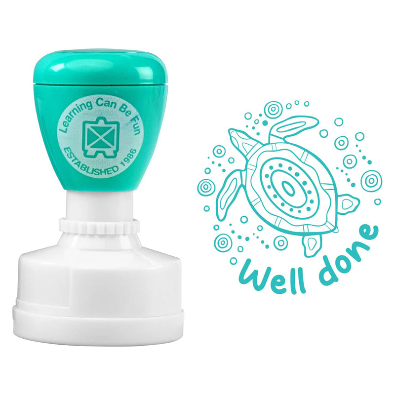 Isolated product image showing the Ocean Country Turtle Merit Stamp alongside the complete turtle impression artwork. The image clearly displays the detailed design, self inking construction and uplifting Well Done message.