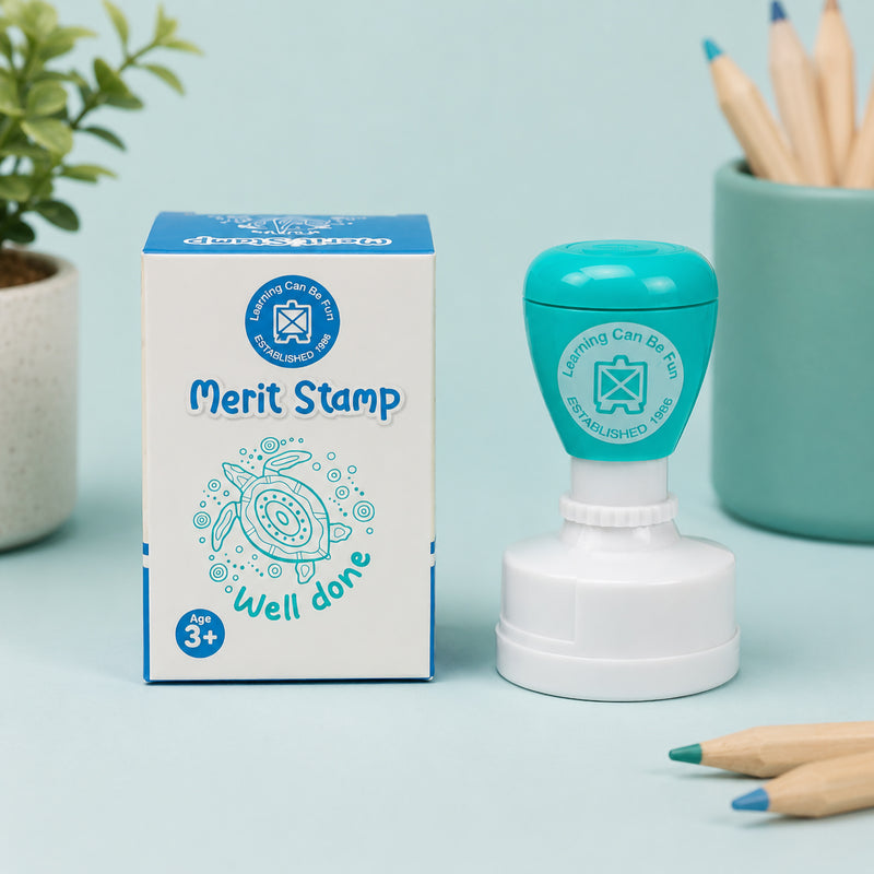 Product packaging and stamp displayed together against a soft blue background. The packaging features the turtle artwork by First Nations artist Holly Sanders, highlighting the cultural inspiration and educational value of the Ocean Country collection.