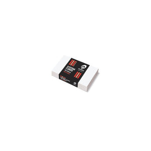 Stack of blank white Olympic system cards in the small size, held by a black band with red stripes printed System Cards 75x125mm 100 Cards