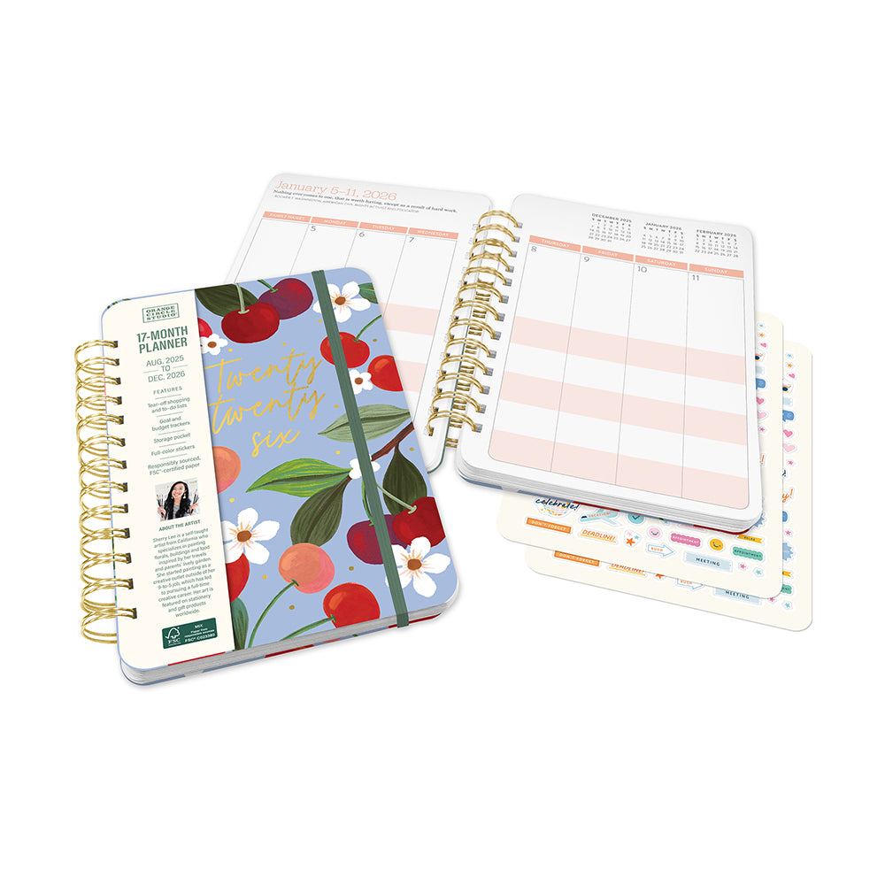 Orange Circle 2026 Do It All diary Fruit and Flora, diary open on a weekly spread with stickers and lists beside it