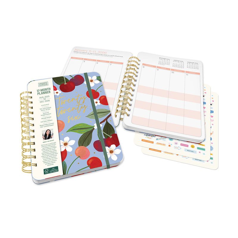 Orange Circle 2026 Do It All diary Fruit and Flora, diary open on a weekly spread with stickers and lists beside it