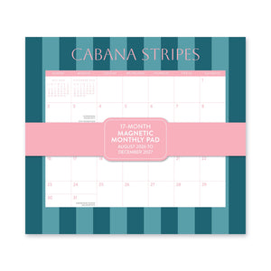 Orange Circle 2027 Magnetic Monthly Pad in Cabana Stripes, pink title over dark and light teal stripes, with a pink band reading 17-Month Magnetic Monthly Pad across the August grid.