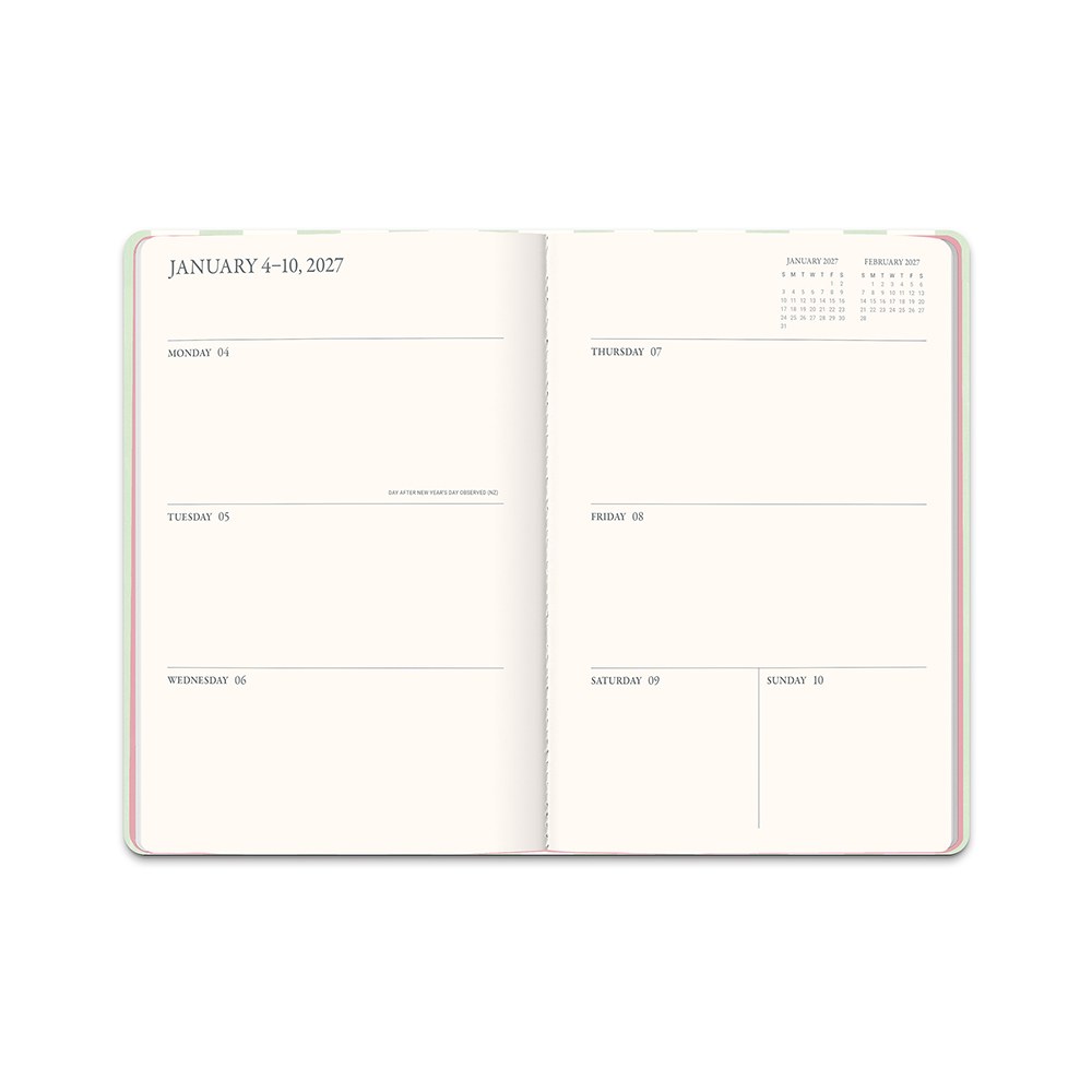 Orange Circle 2027 Casebound Diary 143 x 205mm Month To View Cabana Stripes shown at a three quarter angle, the Cabana Stripes design, a crisp vertical stripe in soft coastal tones, highlighting the cover finish and binding edge.