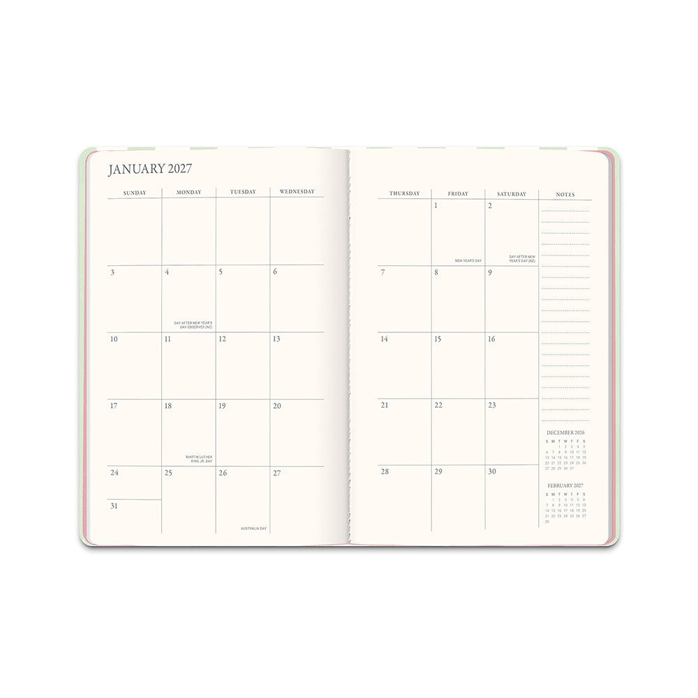 Orange Circle 2027 Casebound Diary 143 x 205mm Month To View Cabana Stripes opened to show the printed month to view interior pages and the dated planning grid.