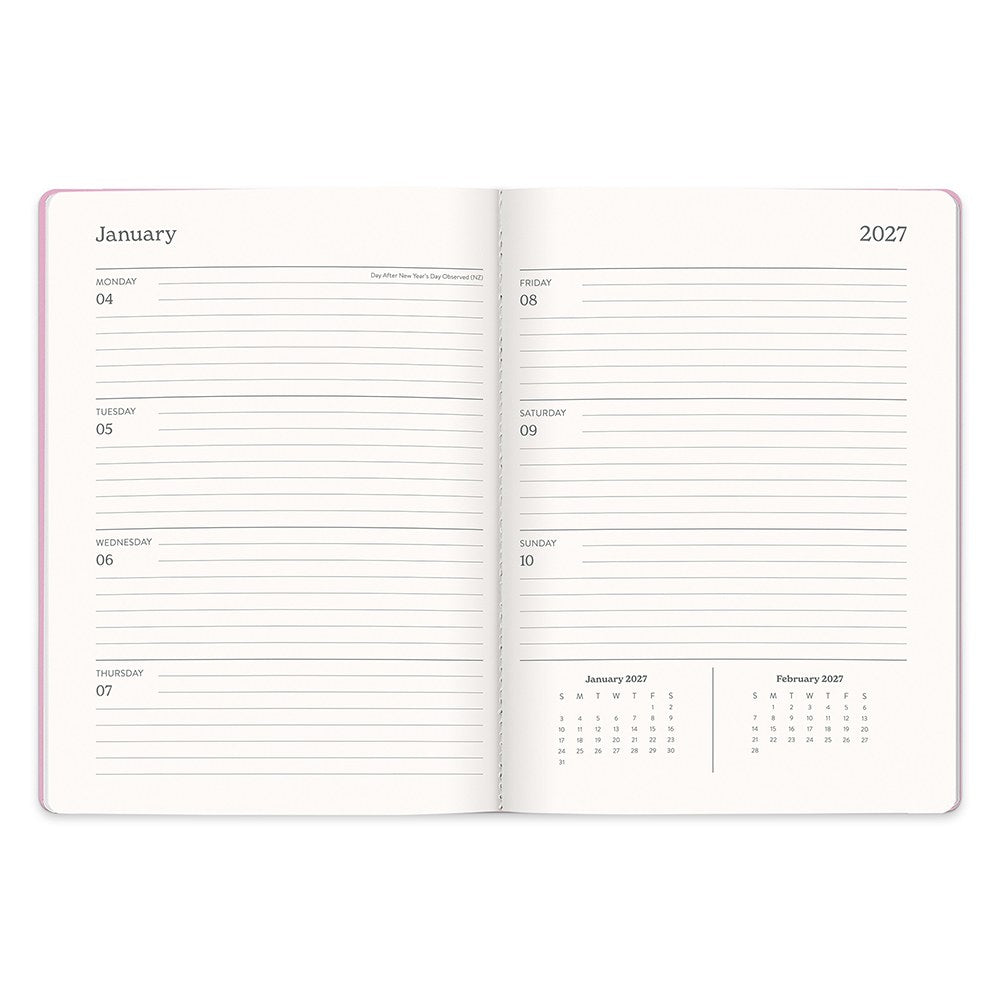 Orange Circle 2027 Casey Diary 178 x 240mm Week To View Cabana Stripes shown at a three quarter angle, the Cabana Stripes design, a crisp vertical stripe in soft coastal tones, highlighting the cover finish and binding edge.