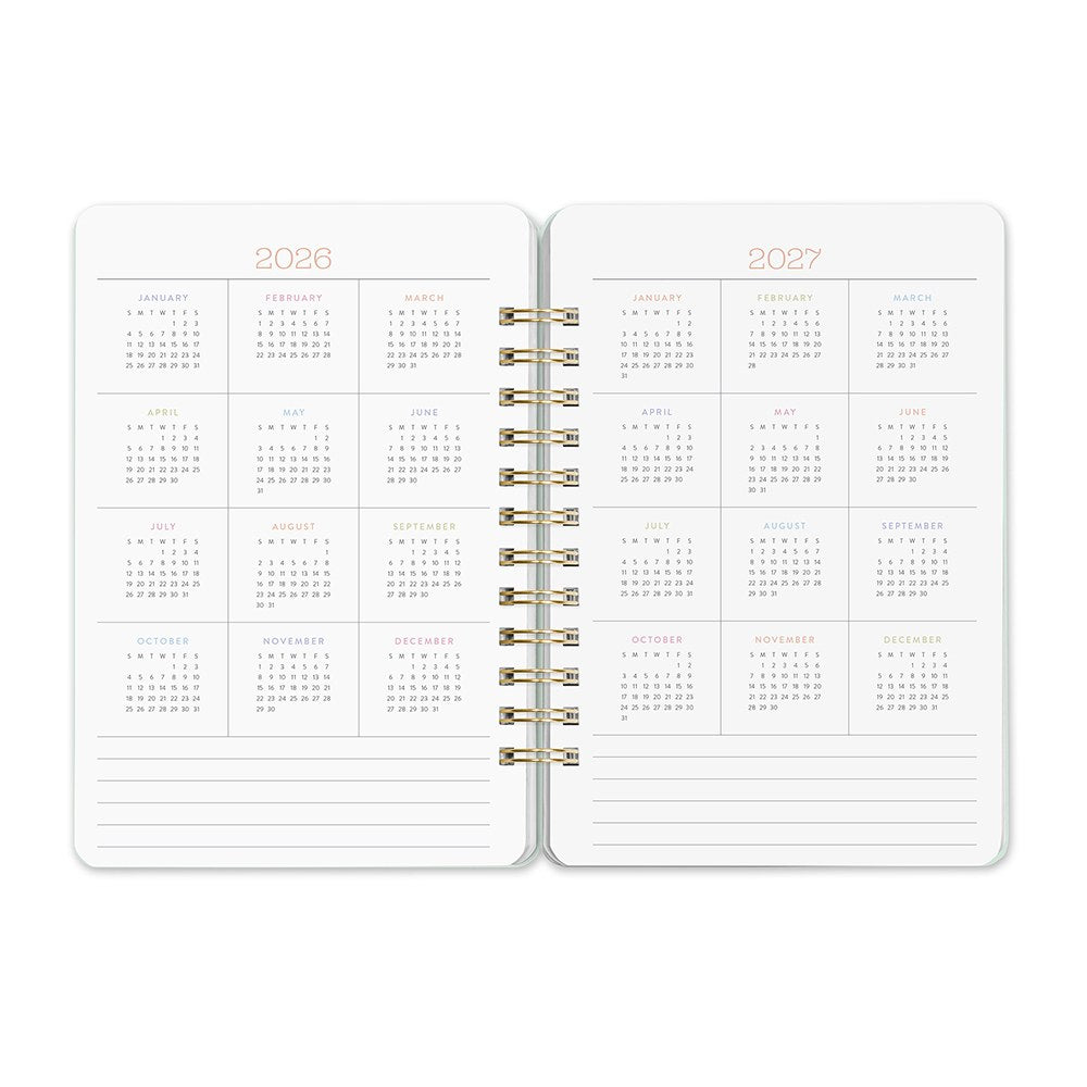 Orange Circle 2027 Do-It-All Diary 146 x 210mm Week To View Fruit And Flora shown from a second angle, the Fruit And Flora design, a bright botanical mix of fruit and flowers, with the spine and page block edge visible.