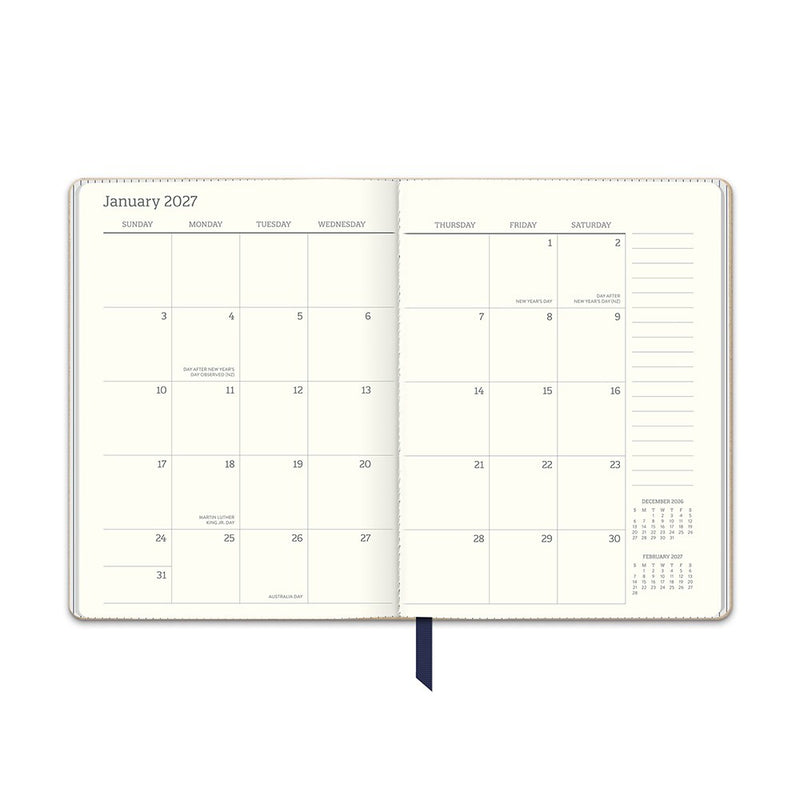 Orange Circle 2027 Medium Dual-Textured Diary 142 x 193mm Week To View Dots On Navy opened to show the printed week to view interior pages and the dated planning grid.