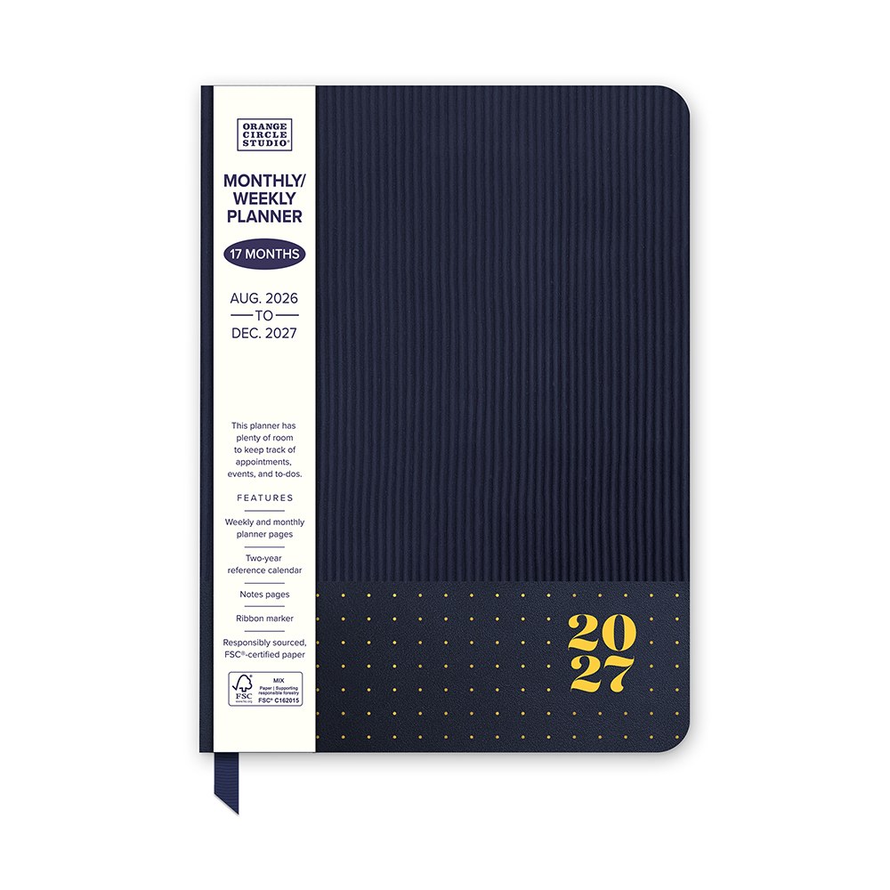 Orange Circle 2027 Medium Dual-Textured Diary 142 x 193mm Week To View Dots On Navy shown in its retail packaging, front of pack with the year and format printed on the label.