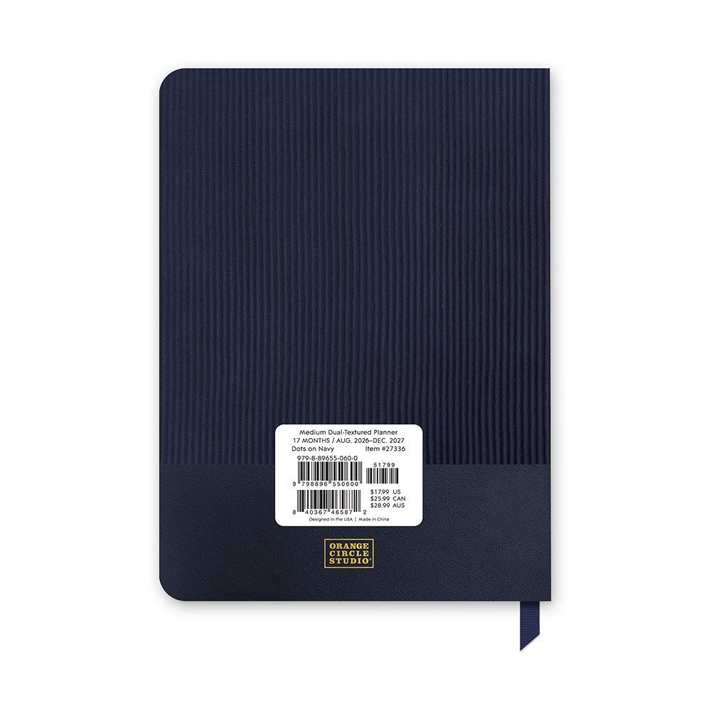 Orange Circle 2027 Medium Dual-Textured Diary 142 x 193mm Week To View Dots On Navy retail packaging shown from the back, with the barcode panel and product details visible.