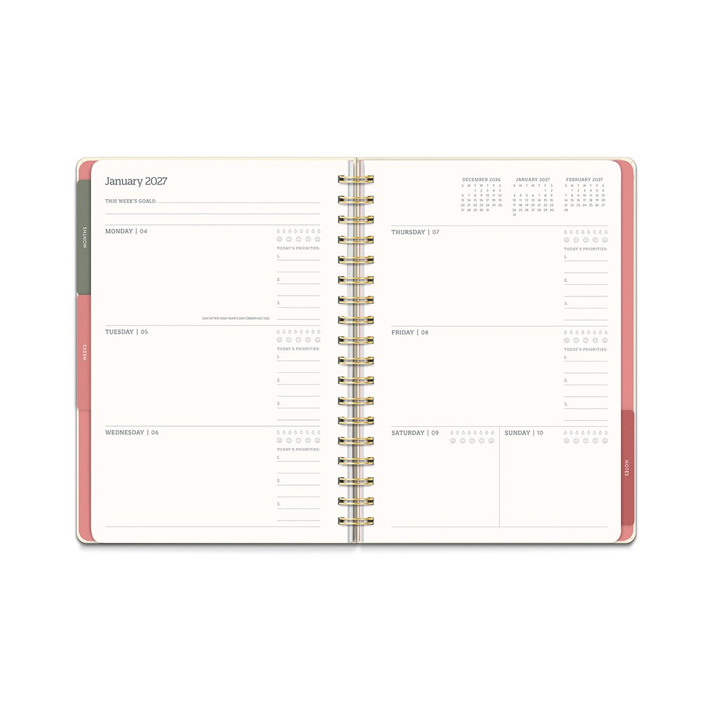 Orange Circle 2027 Tri-Tab Diary 178 x 244mm Week To View Age Of Romance shown at a three quarter angle, the Age Of Romance design, a moody vintage rose print with deep botanical tones, highlighting the cover finish and binding edge.