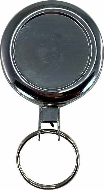 Front view of the Osmer retractable metal reel out of the packet, round chrome case with dark centre and split key ring