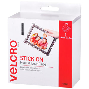 Angled view of the white VELCRO Brand Stick On Hook and Loop Tape retail box on a plain white background, red side panel showing a tape roll icon with 19mm x 1.8m and code P20141, front panel picturing a hand mounting a framed family photograph