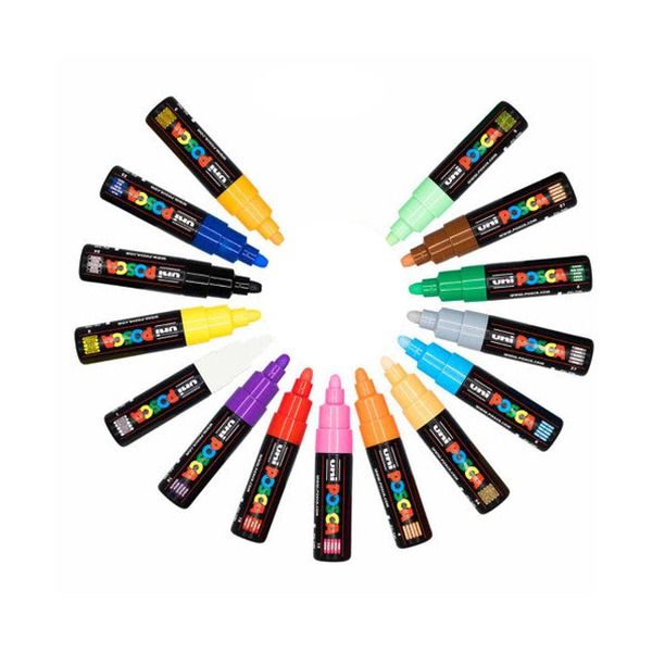 15 Uni Posca paint markers arranged in a circular pattern on a white background, showing a variety of colours including yellow, blue, green, brown, grey, light blue, purple, red, pink, orange, and beige.