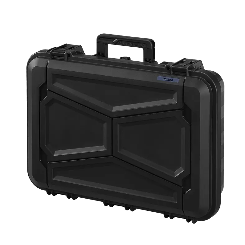 Closed Panaro EKO90 case in smoke grey at an angle, showing the faceted lid and carry handle