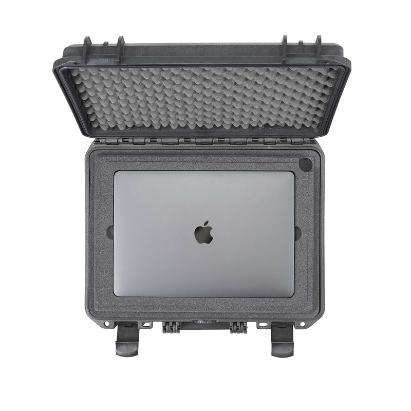 Overhead view of a laptop held in the Panaro foam holder inside an open black MAX380 case