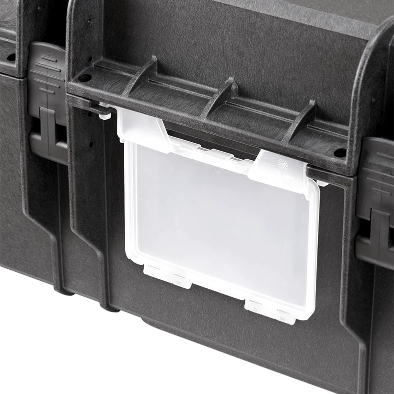 Close up of the clear document holder clipped to the front of a Panaro MAX1090 case