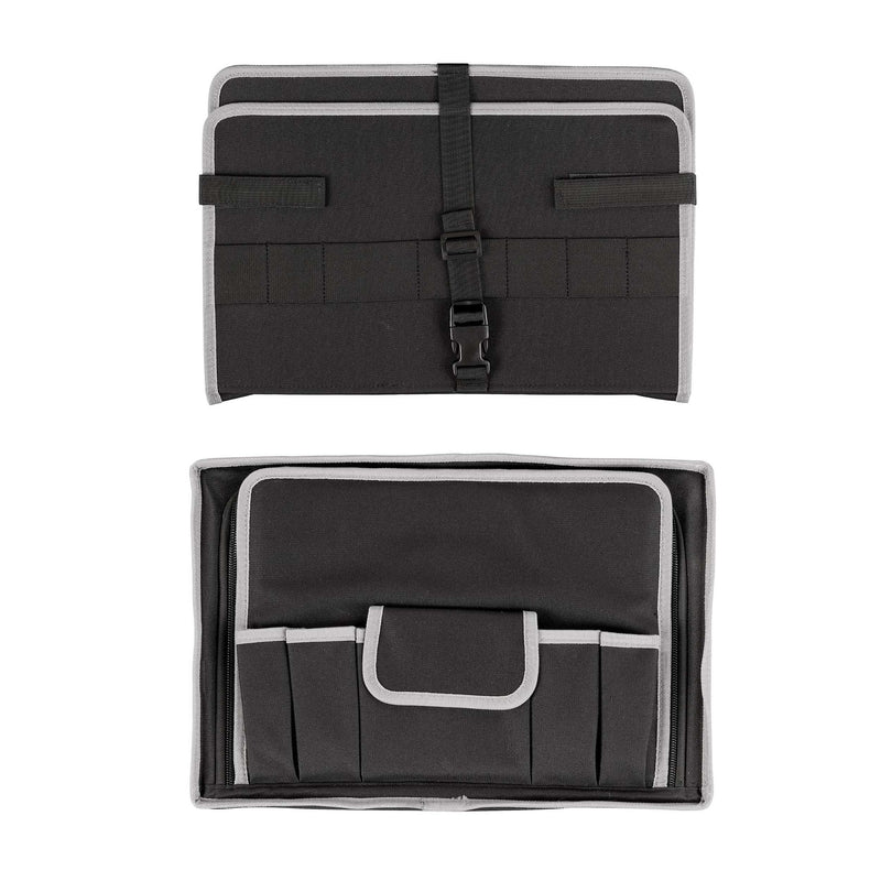 The TC tool storage insert out of the case: a folded fabric panel with buckle strap above the base tool holder