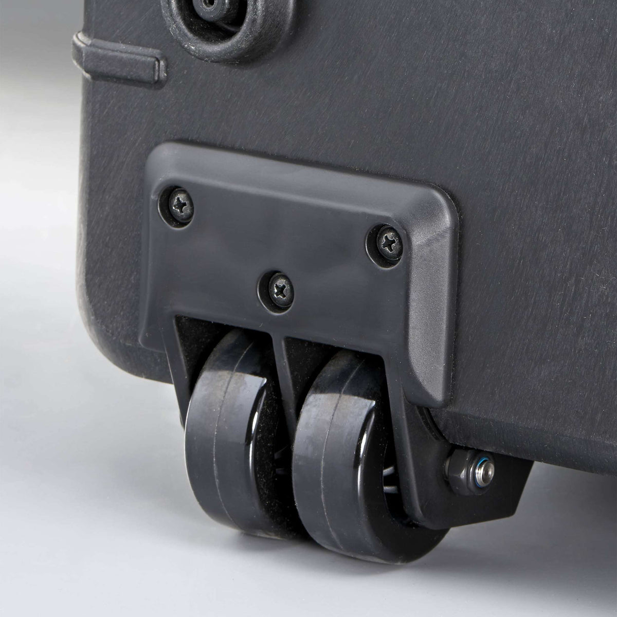 Close-up of the twin wheels fitted to the corner of a Panaro MAX750 case