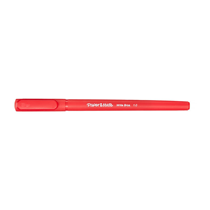 A single red Paper Mate Write Bros. 1.0 ballpoint pen with its cap and clip fitted, lying flat on a white background.