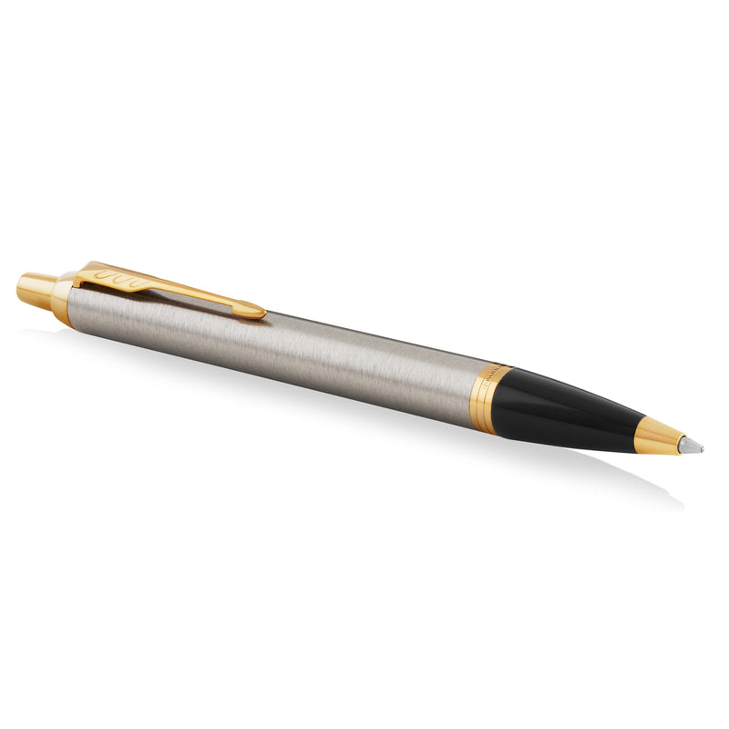 Brushed metal and gold IM ballpoint lying at an angle with the gold clip on top