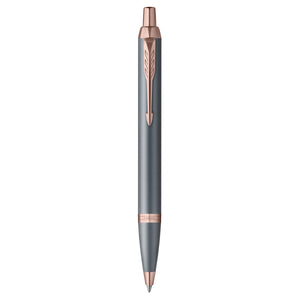 Parker IM Finishing Touch ballpoint pen in slate standing upright, showing the arrow clip and rose-toned trims