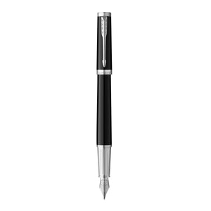 Parker Ingenuity fountain pen uncapped, black lacquer with chrome trims and a steel nib, standing upright on white