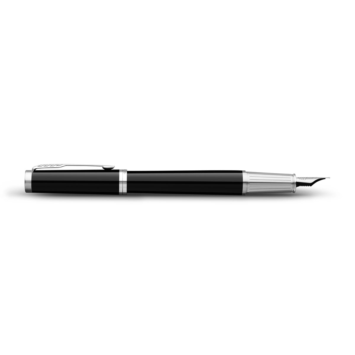 Side view of the capped black and chrome Ingenuity fountain pen lying flat