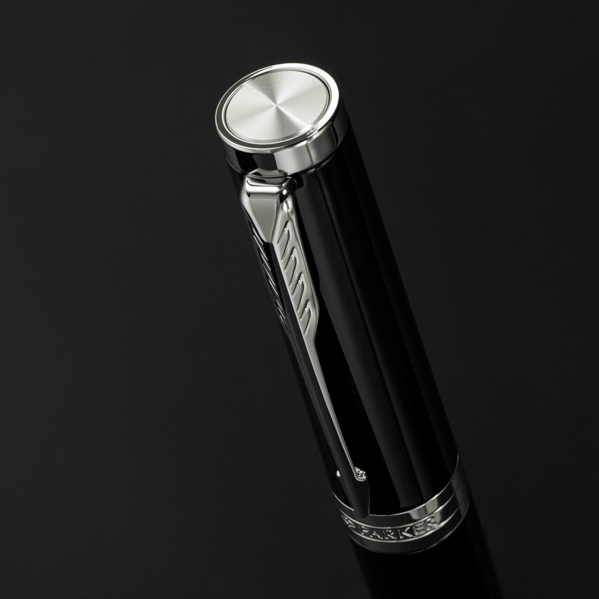 Close-up of the chrome cap top and clip on the black lacquer Ingenuity cap