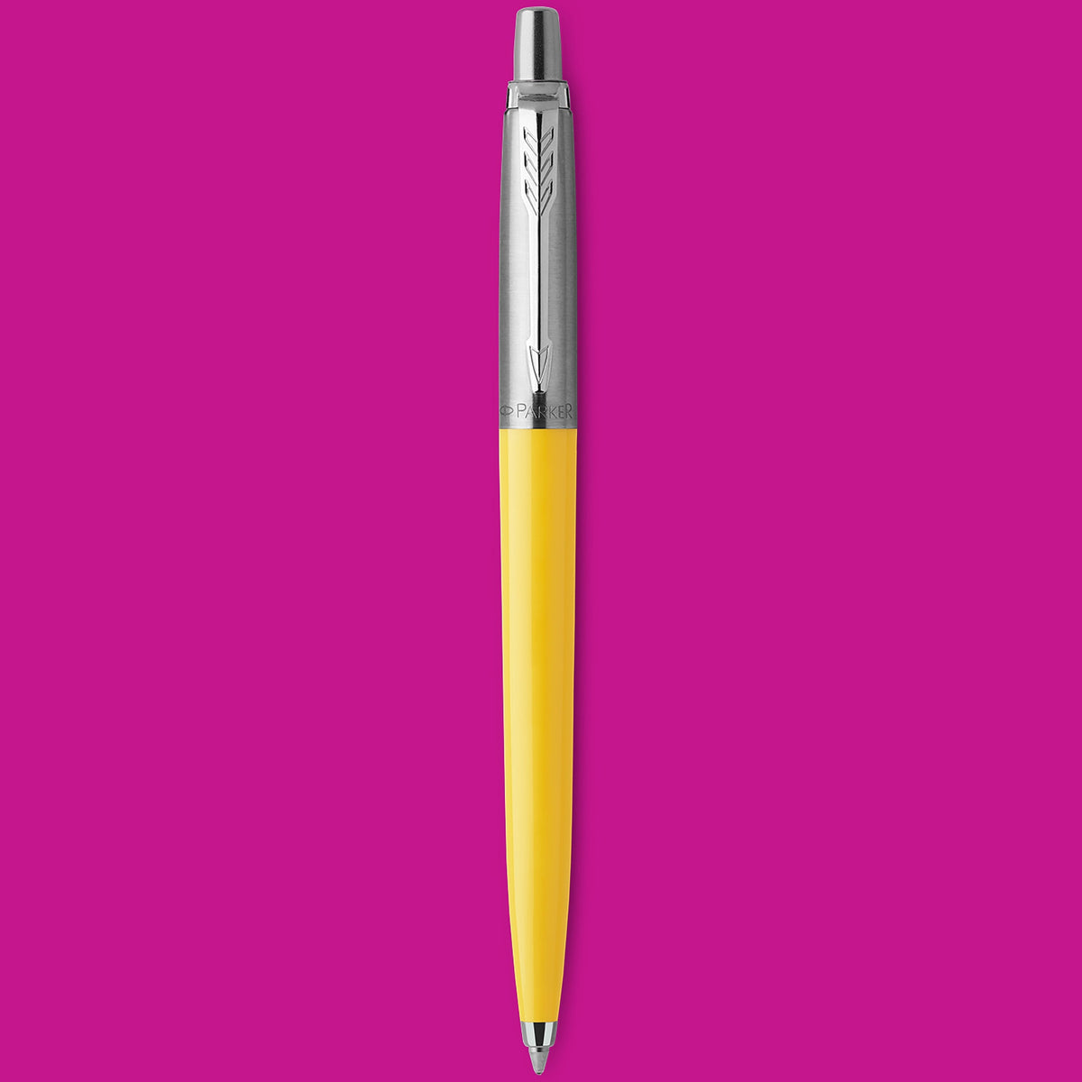 Yellow Jotter Original ballpoint standing upright on a magenta background
