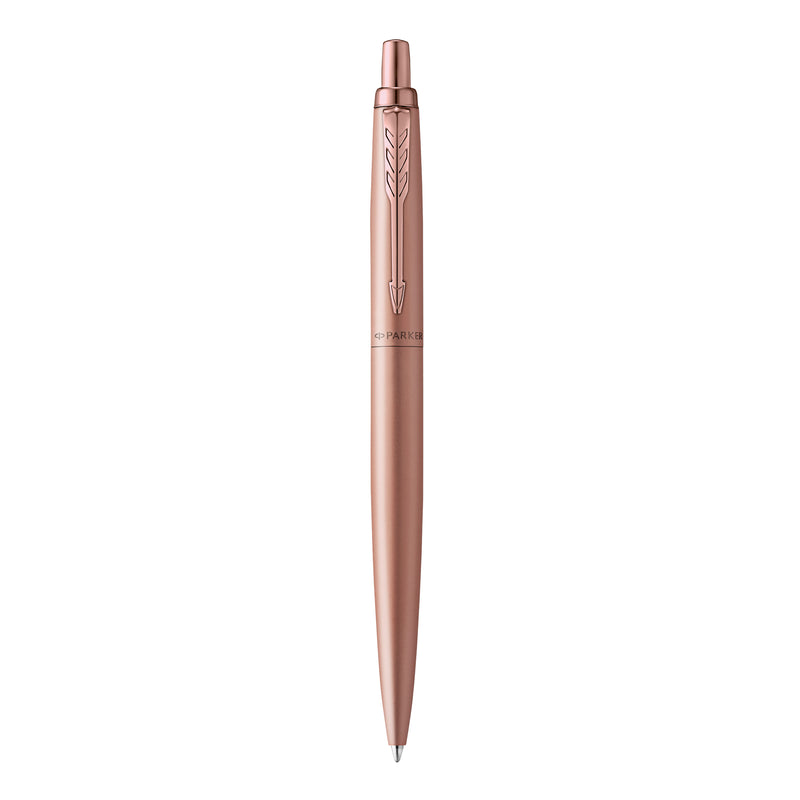 Parker Jotter XL Monochrome ballpoint in matte rose gold standing upright, pink gold clip and click button