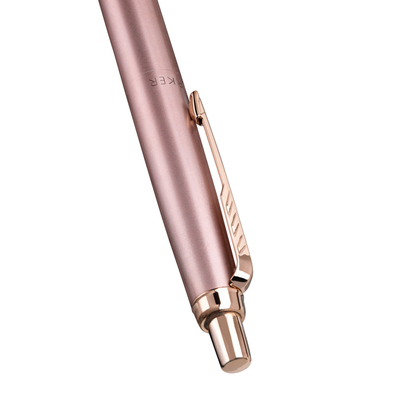 Close-up of the pink gold arrow clip and click top of the rose gold Jotter XL