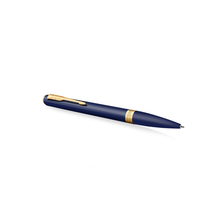 Blue Meridian ballpoint lying at an angle with the arrow clip on top and the gold PVD centre band visible