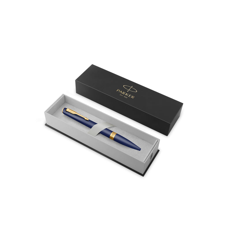Blue Meridian ballpoint resting in an open black Parker gift box with a grey insert, lid standing behind