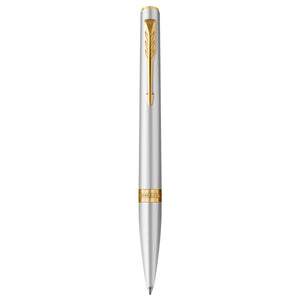 Parker Meridian ballpoint pen in chrome lacquer with gold trims standing upright, showing the arrow clip, centre band and medium tip
