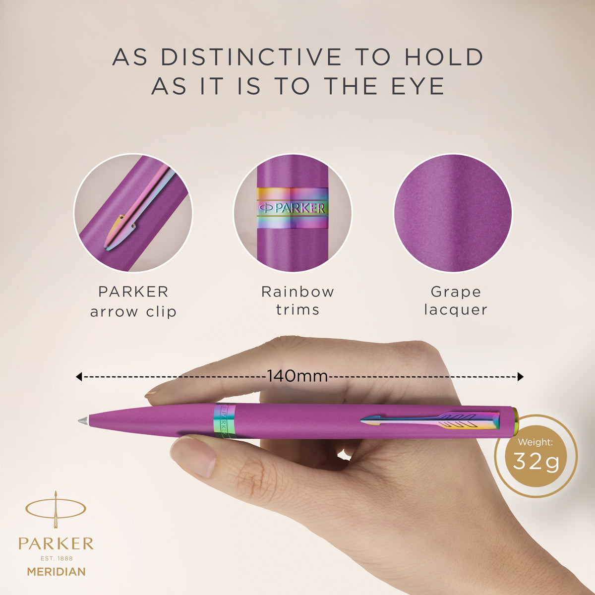 Hand holding the grape Meridian ballpoint with close-ups of the PARKER arrow clip, rainbow trims and grape lacquer, marked 140 mm long and 32 g