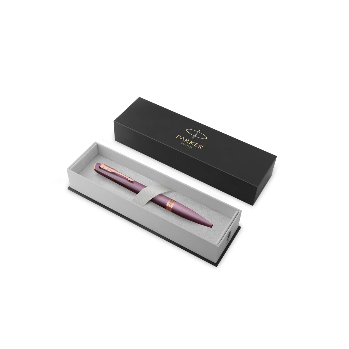 Purple Meridian ballpoint resting in an open black Parker gift box with a grey insert, lid standing behind