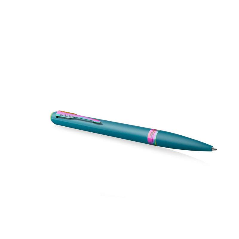 Teal Meridian ballpoint lying at an angle with the arrow clip on top and the rainbow PVD centre band visible