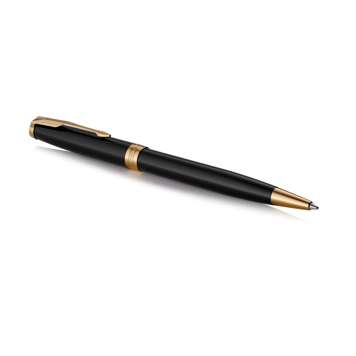 Black lacquer Sonnet ballpoint lying at an angle, gold clip at the upper left and gold cone at the tip