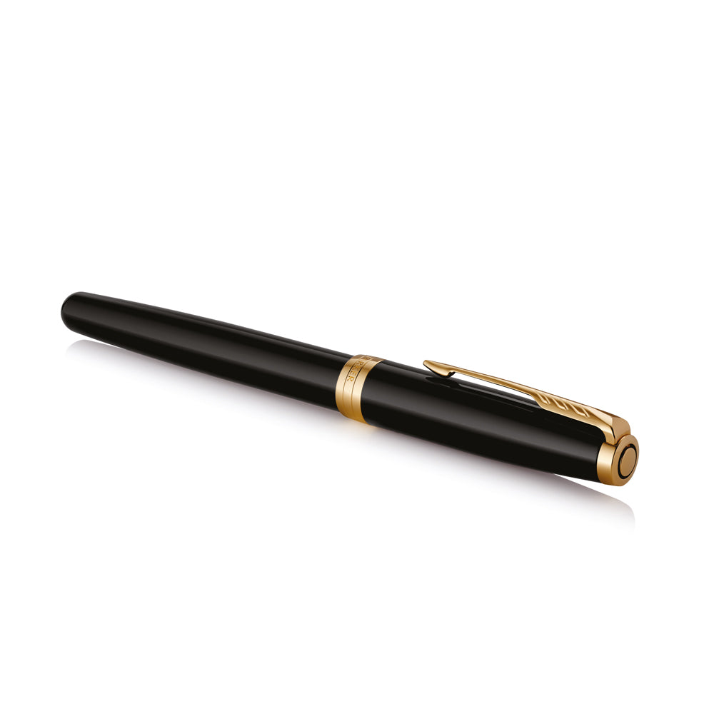 Capped black lacquer Sonnet fountain pen lying at an angle, clip facing the camera