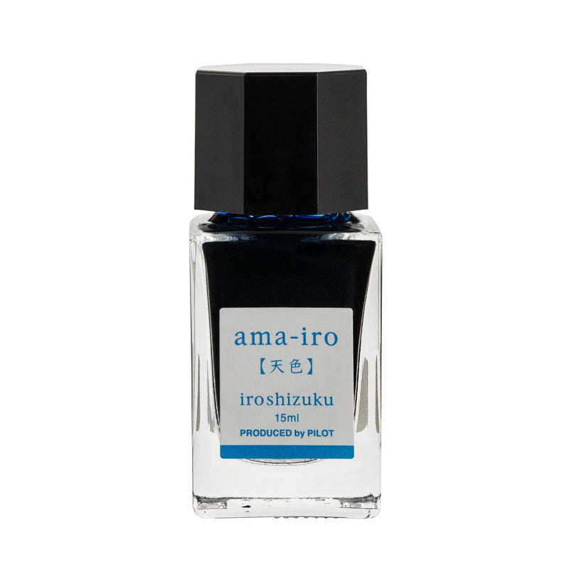 Pilot Iroshizuku 15ml bottle of Sky Blue (Ama-iro) fountain pen ink, a faceted clear glass bottle of bottled ink shown upright on a white background.