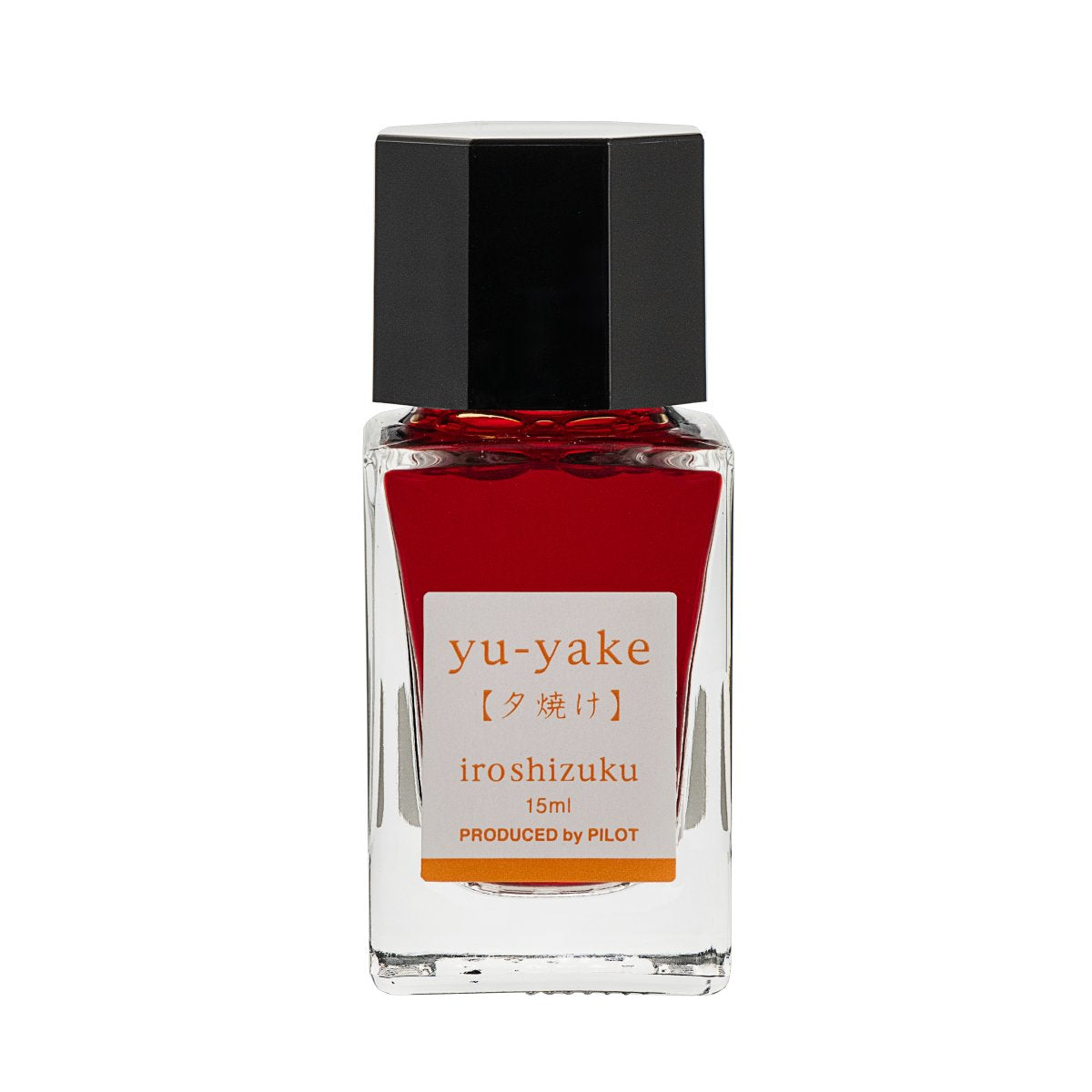 Pilot Iroshizuku 15ml bottle of Sunset Ink (Yu-yake) fountain pen ink, a faceted clear glass bottle of bottled ink shown upright on a white background.