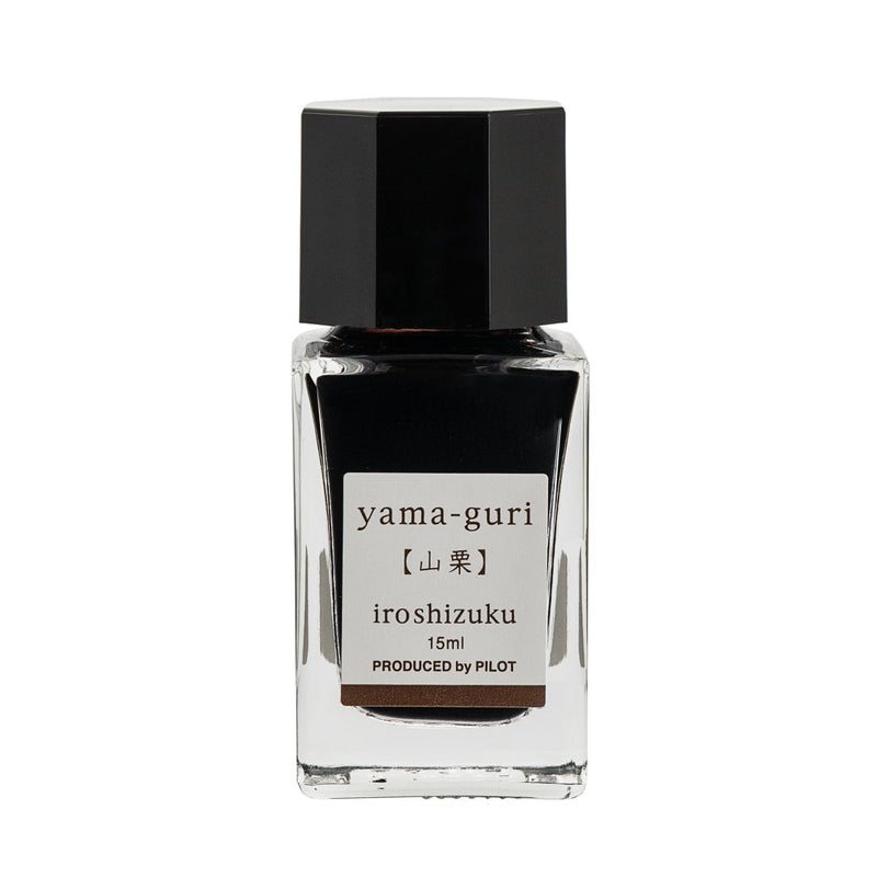 Pilot Iroshizuku 15ml bottle of Wild Chestnut Ink (Yama-guri) fountain pen ink, a faceted clear glass bottle of bottled ink shown upright on a white background.