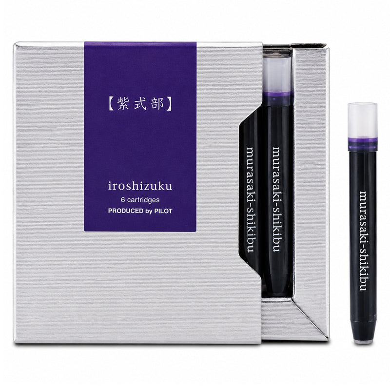 Studio product image showing the Pilot Iroshizuku Murasaki Shikibu fountain pen ink cartridge presentation box with a single Japanese Beautyberry purple cartridge displayed separately on a clean white background, highlighting the premium packaging and authentic Pilot cartridge design.
