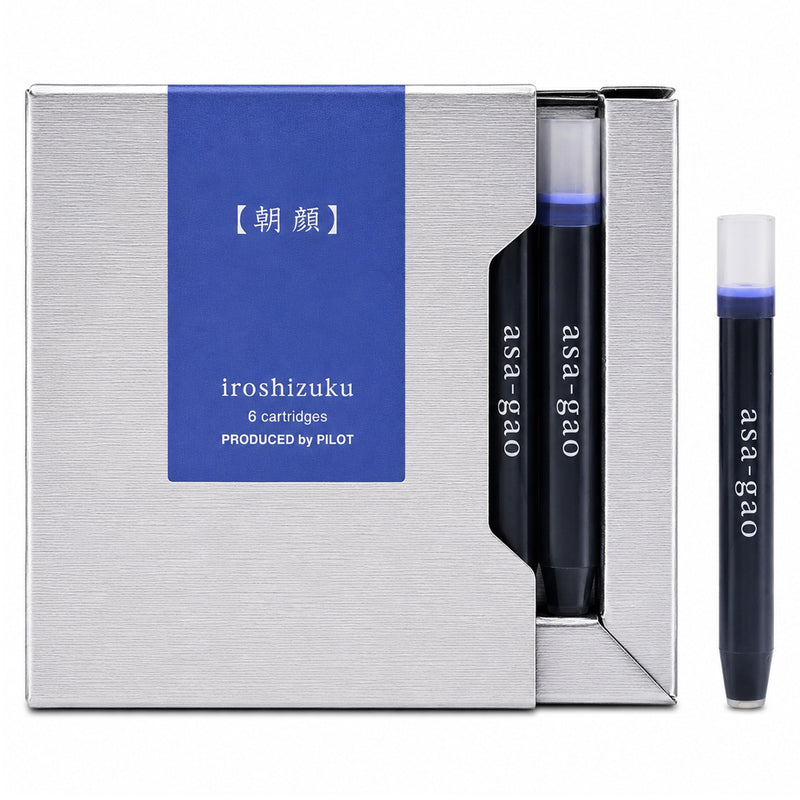 Studio product image showing the Pilot Iroshizuku Asa gao fountain pen ink cartridge presentation box with a single Morning Glory blue cartridge displayed separately on a clean white background, emphasising the premium packaging and authentic Pilot cartridge design.