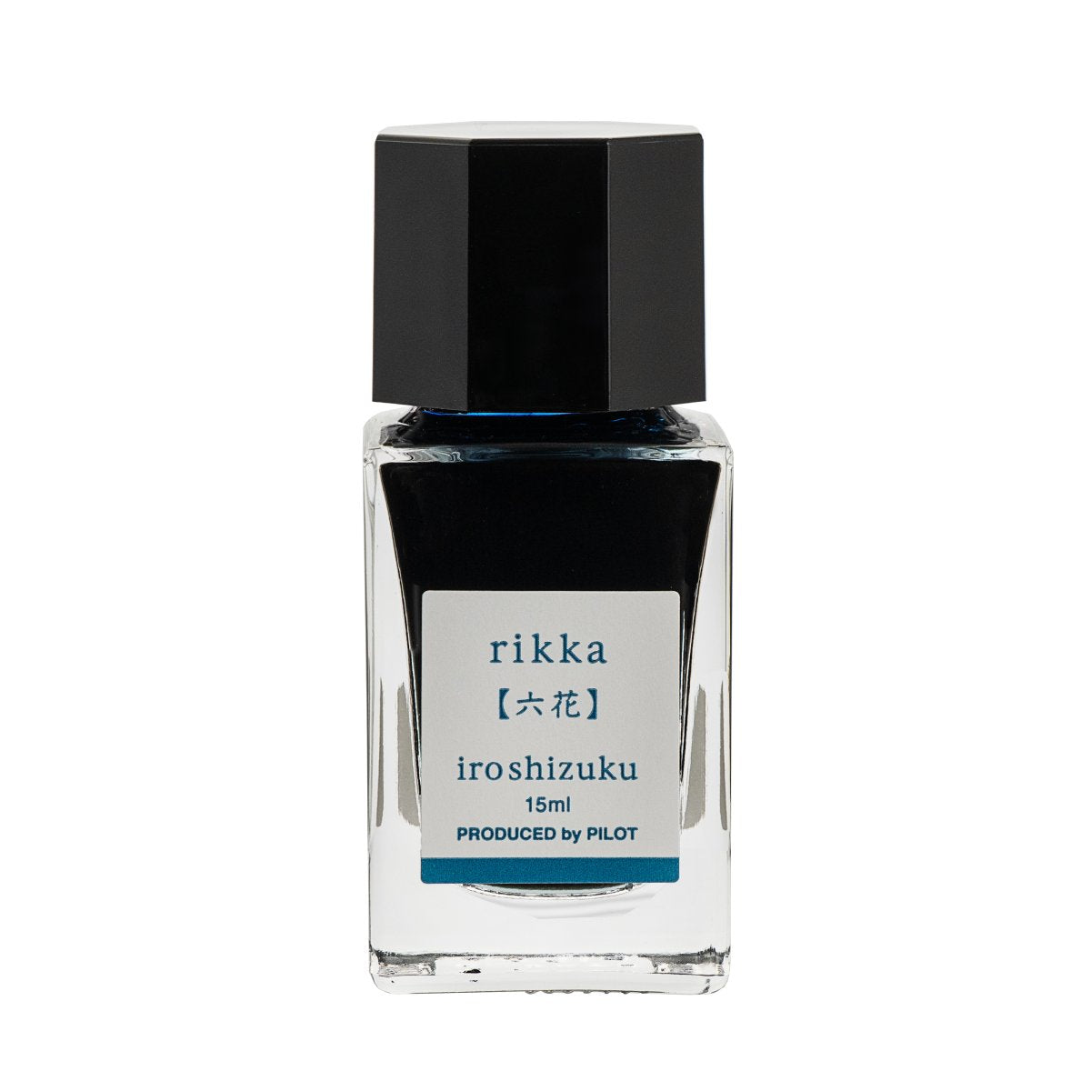 Pilot Iroshizuku 15ml bottle of Snow Crystal (Rikka) fountain pen ink, a faceted clear glass bottle of bottled ink shown upright against a white background.