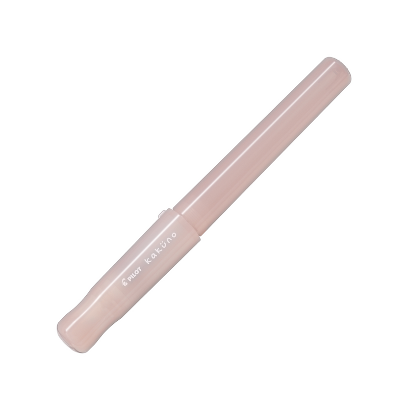 Pilot Kakuno Madoromi fountain pen, fine nib, light pink translucent barrel, a gold-nib beginner fountain pen shown capped on a white background.