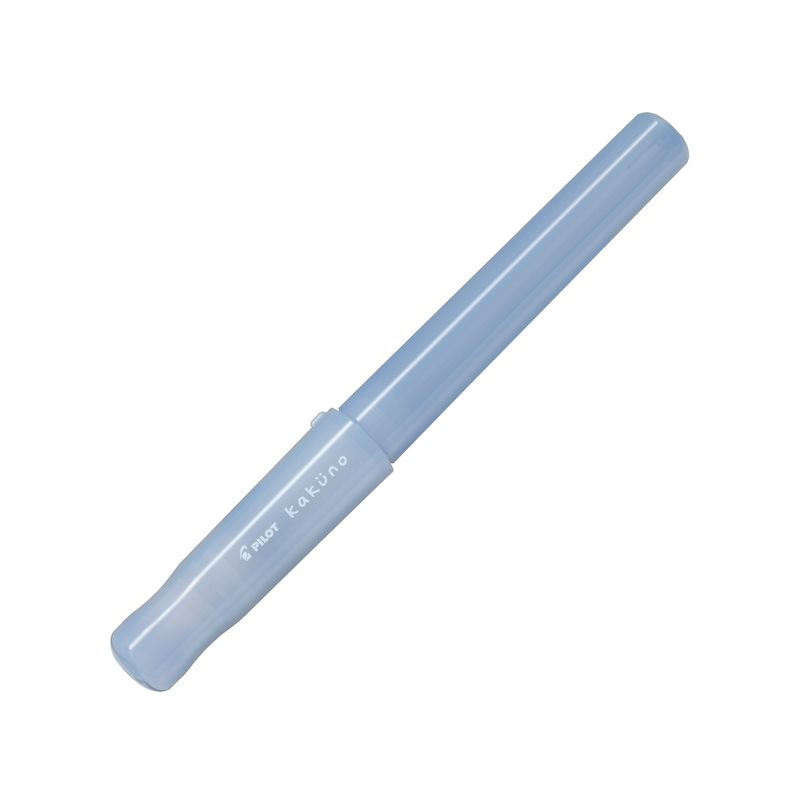 Pilot Kakuno Madoromi fountain pen, medium nib, periwinkle translucent barrel, a gold-nib beginner fountain pen shown capped on a white background.