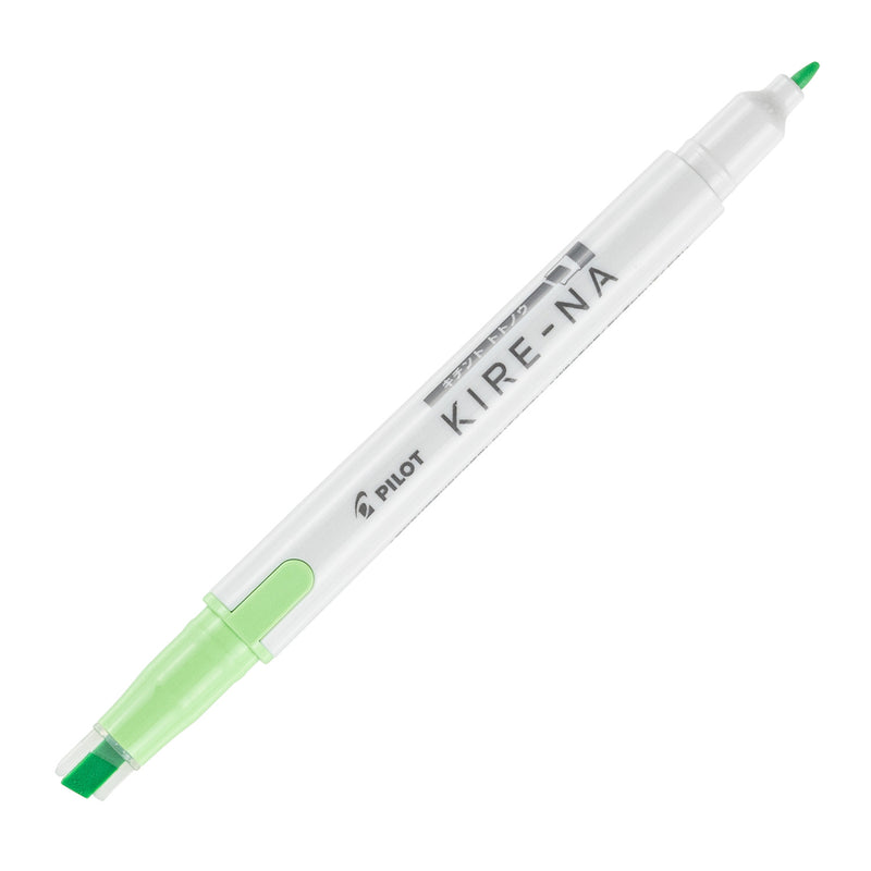 Pilot Kire-Na dual tip highlighter in green, standing upright on white with both caps removed, showing the green chisel tip at the base, the fine bullet tip at the top and the Kire-Na branding on the white barrel