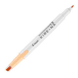Pilot Kire-Na dual tip highlighter in orange, standing upright on white with both caps removed, showing the orange chisel tip at the base, the fine bullet tip at the top and the Kire-Na branding on the white barrel