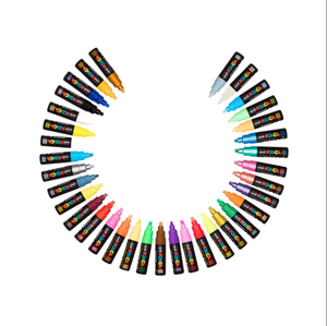 A set of 36 posca marker pens arranged in a large semi-circle on a plain white background, showcasing a wide variety of colors.